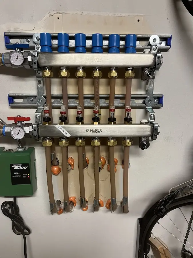 Plumber performing Leak Detection at a residential property in Valley Falls